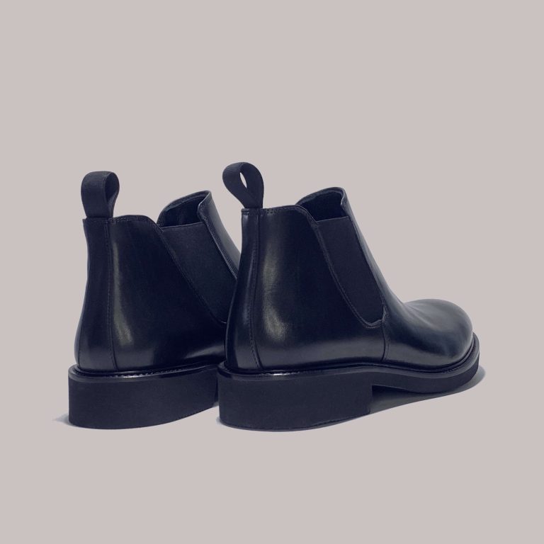 High-quality black calf leather boots for men, customizable for retailers.