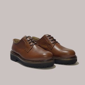 Side view of 'L'EDUCATO' Italian dress shoes, showcasing premium craftsmanship for B2B customers.