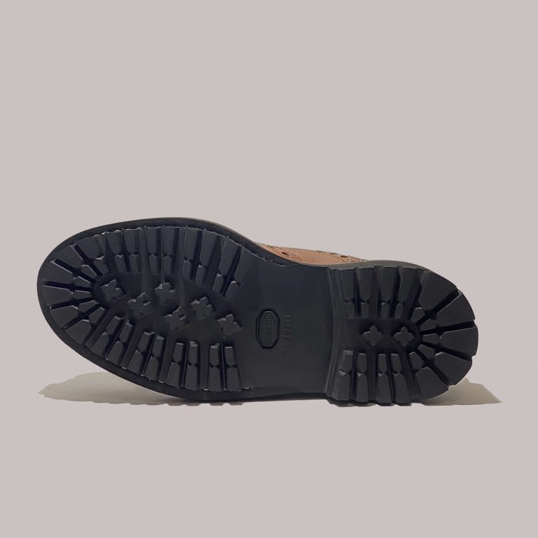 Top view of brown hammered calfskin leather shoes, ideal for modern retailers seeking quality footwear.
