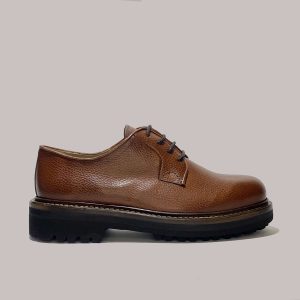 Elegant Italian made dress shoes in brown hammered calfskin leather for upscale retail.