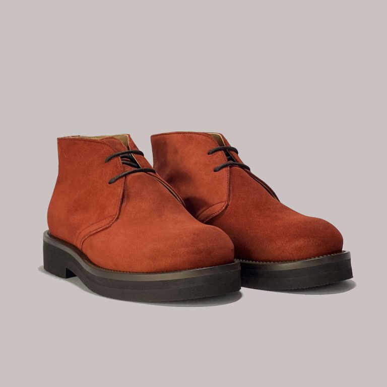 Handcrafted Italian men's boots for luxury retailers, red suede